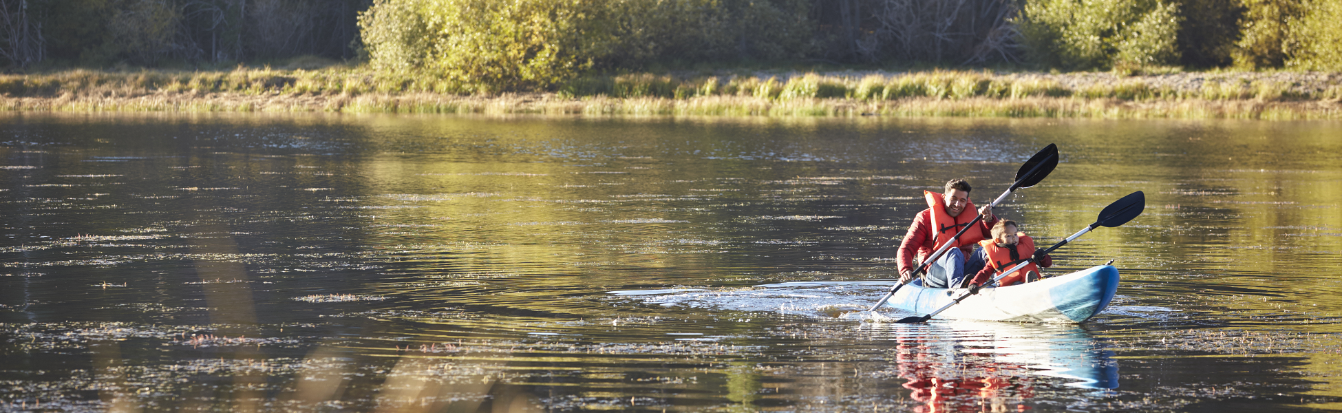 Parent and child kayaking