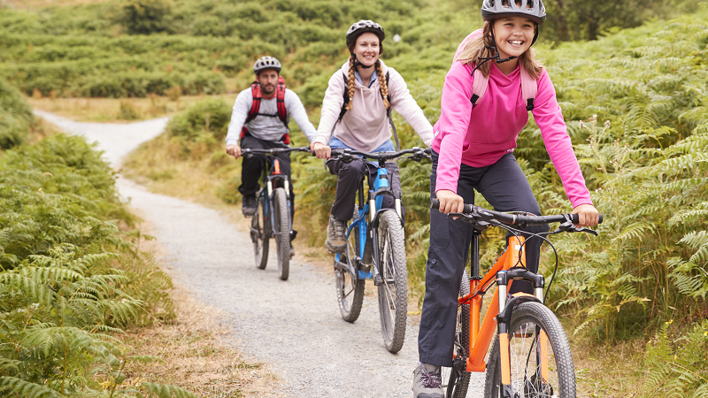 Family on mountain bikes
